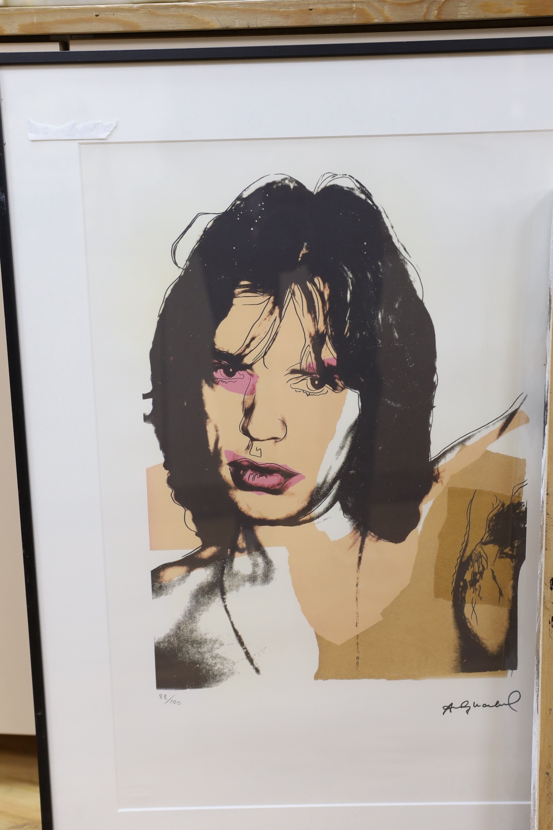 Andy Warhol, limited edition print, ‘’Mick Jagger 141’’, signed in the plate, 88/100, 55 x 38cm, and a mixed media panel depicting the same subject, 61 x 49cm, unframed